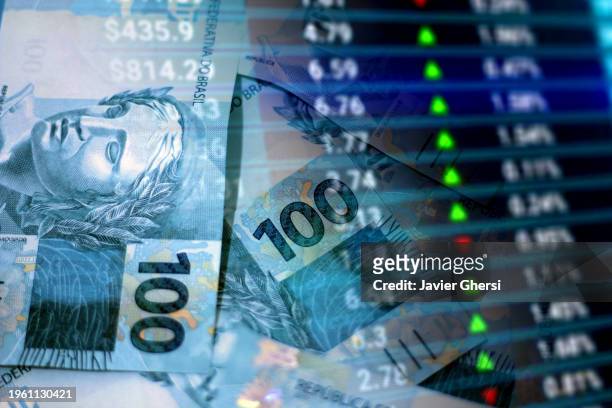 cash real bills and stock market indicators - brazilian stock exchange stock pictures, royalty-free photos & images