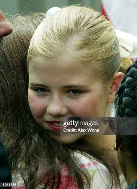 Kidnapped victim Elizabeth Smart gets a hug from Donna Norris, the mother of Amber Hagerman, April 30, 2003 at the Rose Garden of the White House in...
