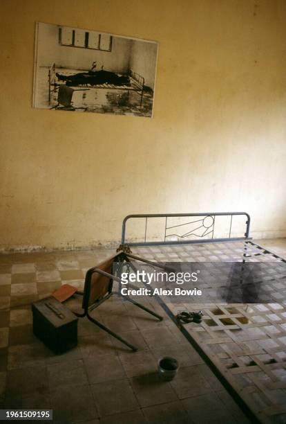 Photograph depicts torture committed against a prisoner during the Khmer Rouge regime at the Tuol Sleng Genocide Museum, Phnom Penh, Cambodia, 8 May...