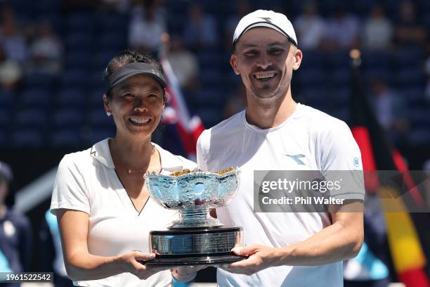 Hsieh Su-wei of Chinese Taipei and Jan Zielinski of Poland pose with the championship trophy after their Mixed Doubles Final against Neal Skupski of...