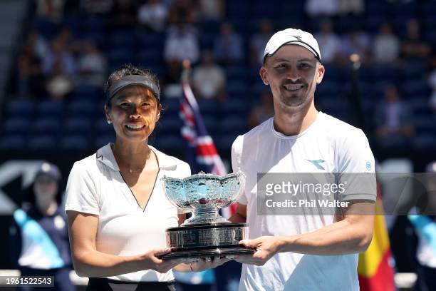 Hsieh Su-wei of Chinese Taipei and Jan Zielinski of Poland pose with the championship trophy after their Mixed Doubles Final against Neal Skupski of...