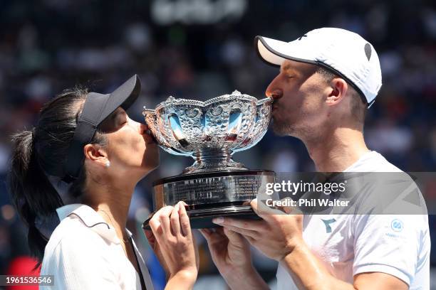 Hsieh Su-wei of Chinese Taipei and Jan Zielinski of Poland pose with the championship trophy after their Mixed Doubles Final against Neal Skupski of...