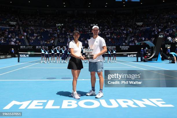 Hsieh Su-wei of Chinese Taipei and Jan Zielinski of Poland pose with the championship trophy after their Mixed Doubles Final against Neal Skupski of...