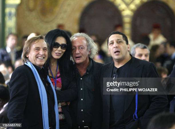 Film directors Algerian Alexandre Arcady and French Yamina Benguigui , French songwriter Didier Barbelivien and Algerian actor Smain pose as they...