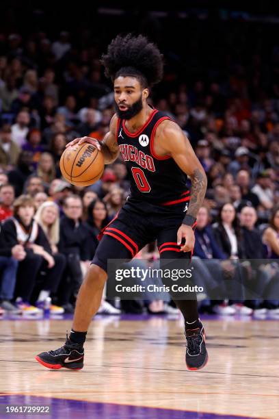 Coby White of the Chicago Bulls controls the ball during the game against the Phoenix Suns at Footprint Center on January 22, 2024 in Phoenix,...