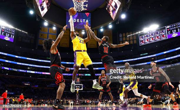 LeBron James of the Los Angeles Lakers takes a shot against DeMar DeRozan of the Chicago Bulls in the second half at Crypto.com Arena on January 25,...