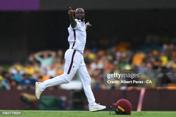 Kemar Roach of West Indies celebrates dismissing Travis Head of Australia during day two of the Second Test match in the series between Australia and...