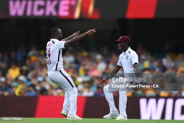 Kemar Roach of West Indies celebrates dismissing Travis Head of Australia during day two of the Second Test match in the series between Australia and...