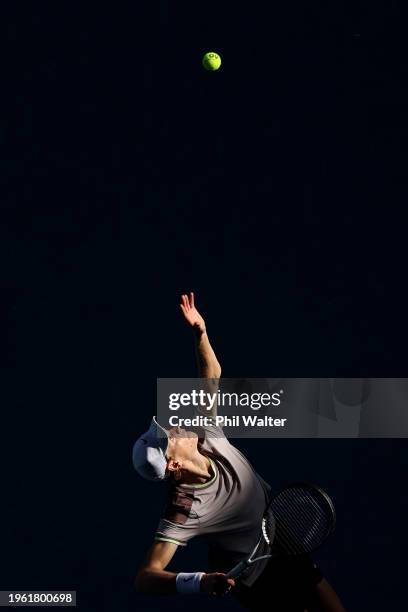 Jannik Sinner of Italy serves in their Semifinal singles match against Novak Djokovic of Serbia during the 2024 Australian Open at Melbourne Park on...