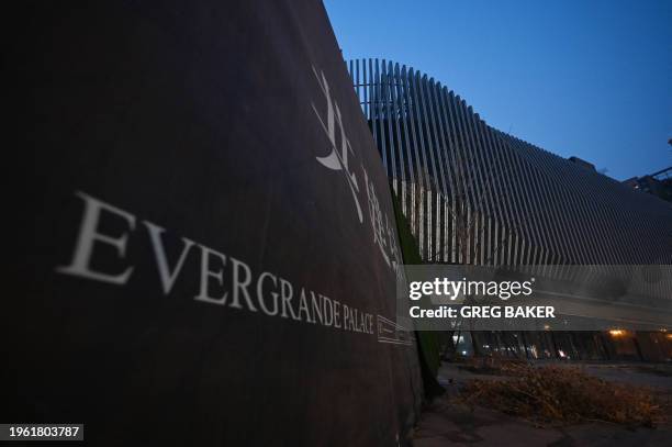 An abandoned Evergrande commercial complex called Evergrande Palace is seen in Beijing on January 29, 2024. A Hong Kong court on January 29 ordered...