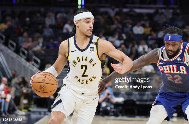 Andrew Nembhard of the Indiana Pacers dribbles the ball against the Philadelphia 76ers during the first half of the game at Gainbridge Fieldhouse on...