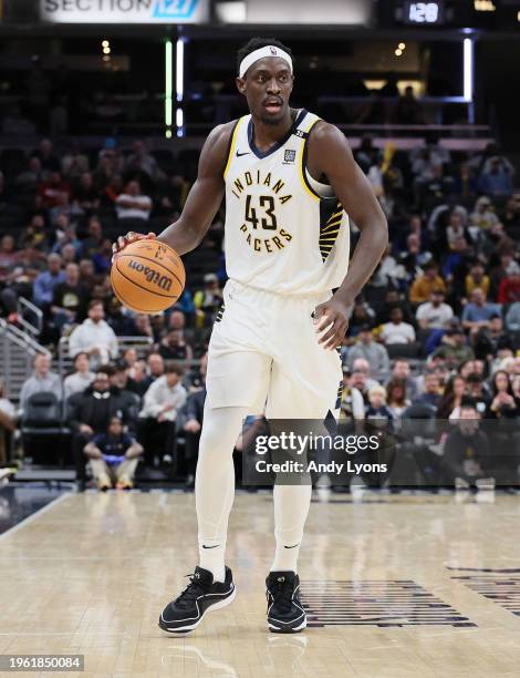 Pascal Siakam of the Indiana Pacers dribbles the ball against the Philadelphia 76ers during the first half of the game at Gainbridge Fieldhouse on...