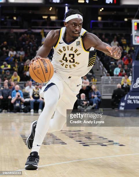 Pascal Siakam of the Indiana Pacers dribbles the ball against the Philadelphia 76ers during the first half of the game at Gainbridge Fieldhouse on...