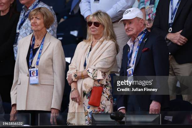 Margaret Court, Susan Johnson and Rod Laver look on at the conclusion of the Semifinal match between Jannik Sinner of Italy and Novak Djokovic of...