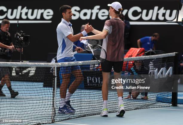 Novak Djokovic of Serbia shakes hands after his loss in their Semi final singles match against Jannik Sinner of Italy during the 2024 Australian Open...