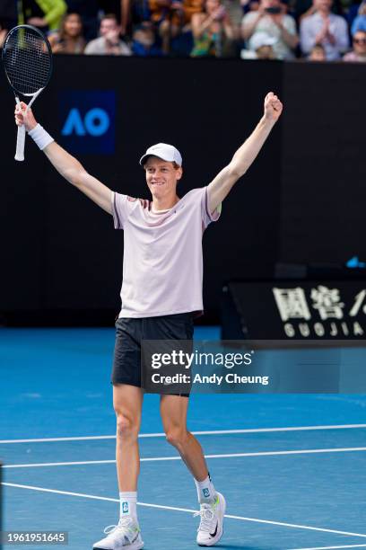 Jannik Sinner of Italy celebrates match point in his semifinal singles match against Novak Djokovic of Serbia during day thirteen of the 2024...