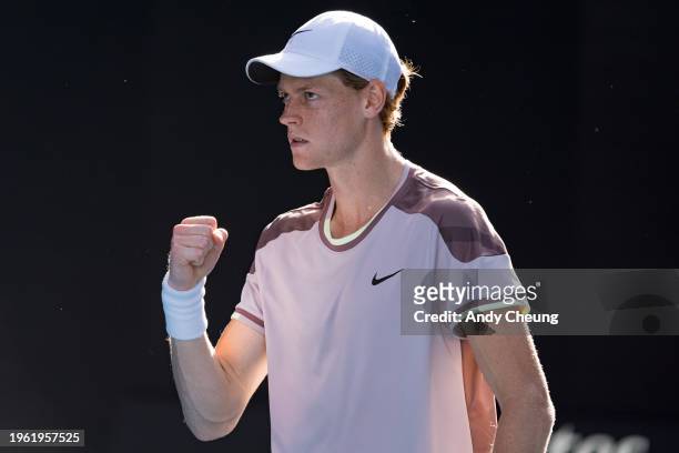 Jannik Sinner of Italy celebrates a point in his semifinal singles match against Novak Djokovic of Serbia during day thirteen of the 2024 Australian...