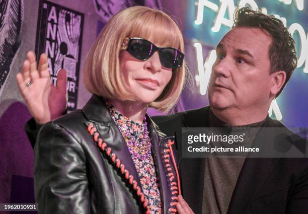 January 2024, Berlin: Fashion designer Guido Maria Kretschmer reacts to the wax figure of Anna Wintour at her presentation at Madame Tussauds. Anna...
