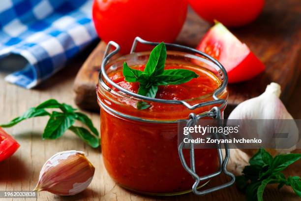 homemade pizza sauce in the glass jar - tomato sauce stock pictures, royalty-free photos & images