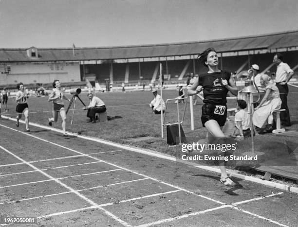 British athlete Diane Leather winning the women's 880 yard race at the Amateur Athletics Association Championships at White City Stadium in London,...