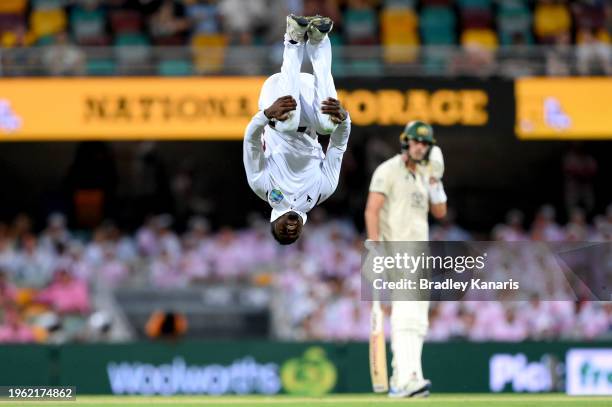 Kevin Sinclair of the West Indies celebrates taking the wicket of Usman Khawaja of Australia during day two of the Second Test match in the series...