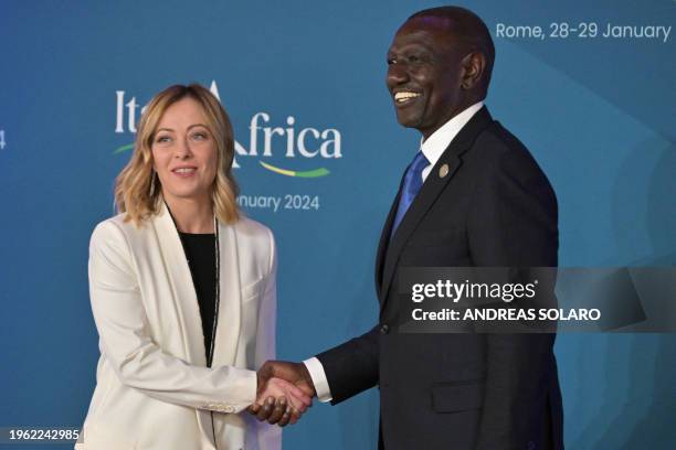 Italy's Prime Minister, Giorgia Meloni welcomes William Samoei Ruto, President of Kenya as he arrives for the Italy-Africa international conference...