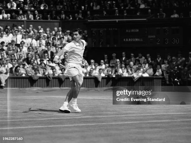 Australian tennis player Ken Rosewall competing in the fourth round of the Wimbledon Tennis Championships in London, July 1956. He is playing against...