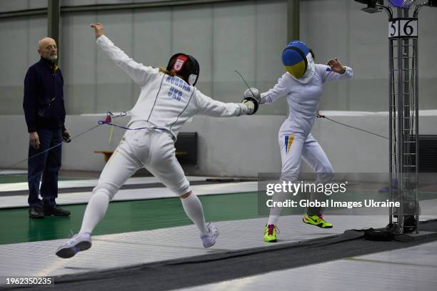 Iryna Kubrak competes against Daryna Zabolotna during the women's epee fencing match, as part of the Fencing Ukrainian Cup Stage 'The Ukrainian...