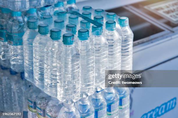 water bottles selling at convenient store near haeundae beach. - wasserflasche stock-fotos und bilder