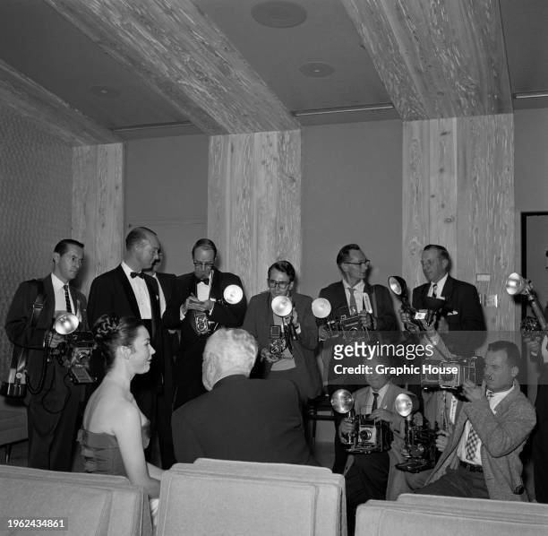 American actress Jennifer Jones sits for photographers in the press room at the inaugural Audience Awards, held at the Beverly Hilton Hotel in...
