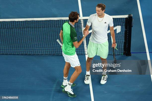 Daniil Medvedev and Alexander Zverev of Germany shake hands after playing their Semifinal match during the 2024 Australian Open at Melbourne Park on...