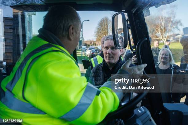 Labour Leader Keir Starmer speaks to a road sweeper during a media opportunity on January 26, 2024 in Reading, England. Today is the second leg of...