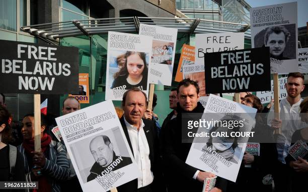 British actor Jude Law and US actor Kevin Spacey join protesters in a march to campaign for free speech in Belarus, in central London, on March 28,...
