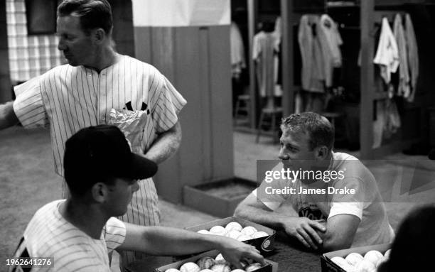 Whitey Ford and Mickey Mantle of the New York Yankees in the clubhouse prior to a game against the Boston Red Sox at Yankee Stadium on June 28, 1963...