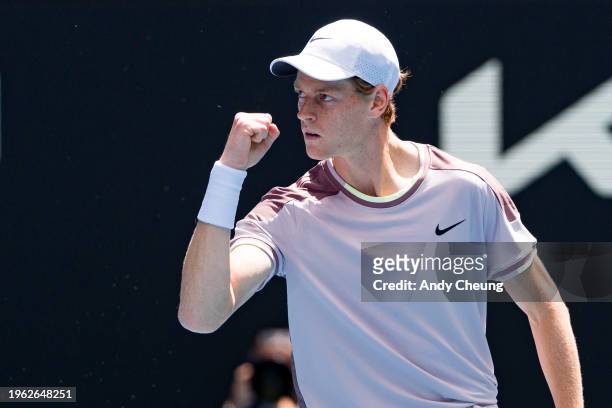 Jannik Sinner of Italy celebrates a point in his semifinal singles match against Novak Djokovic of Serbia during day thirteen of the 2024 Australian...