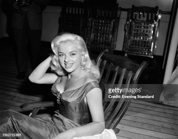 British actress Diana Dors aboard the RMS Queen Elizabeth at Southampton, June 23rd 1956. Dors is travelling to New York.