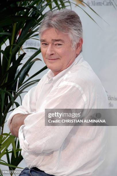 Actor Christian Rauth poses at a photocall for the French TV series 'Pere et Maire' during the 2010 Monte Carlo Television Festival held at Grimaldi...