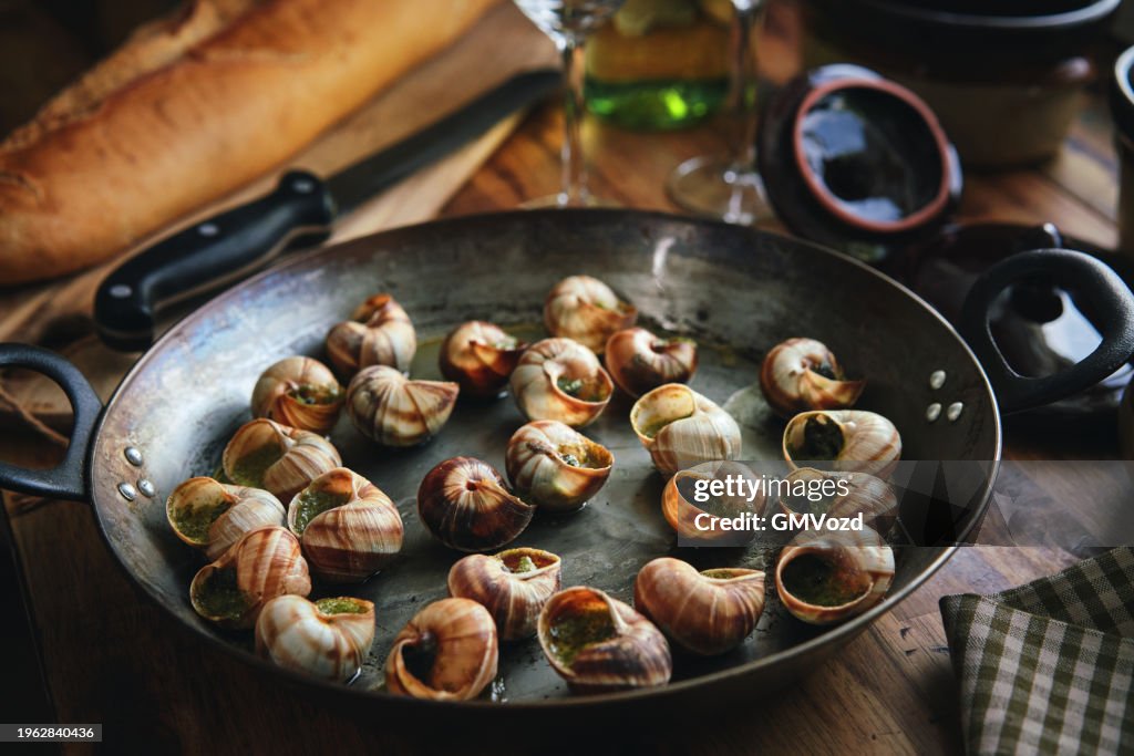 Preparing French Escargot Snails with Herb Butter
