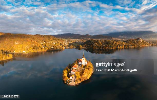 aerial view of lake bled church, slovenia - bled castle stock pictures, royalty-free photos & images