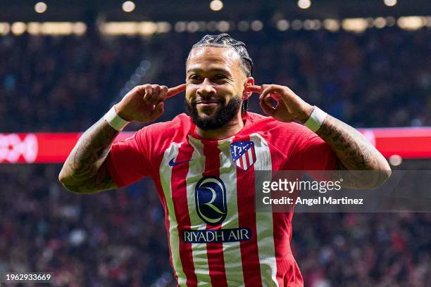 Memphis Depay of Atletico de Madrid celebrates after scoring the team's first goal during the Copa del Rey Quarter Final match between Atletico de...