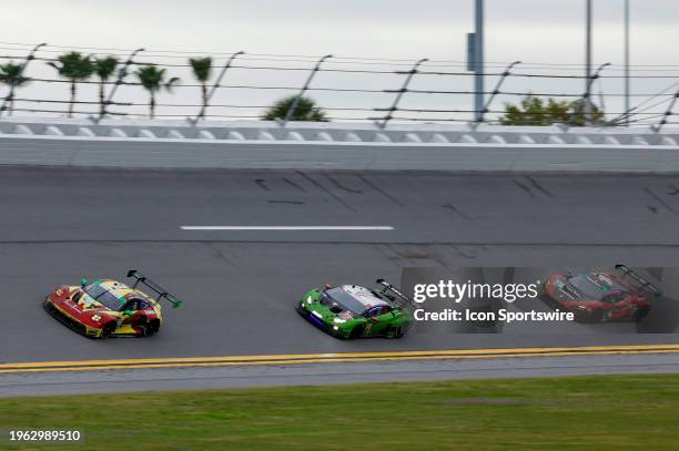 The MDK Motorsports Porsche 911 GT3 R of Kerong Li, Anders Fjordbach, Larry ten Voorde, and Klaus Bachler during the Rolex 24 At Daytona on January...