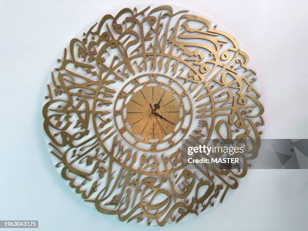 clock with arabic calligraphy - arabic calligraphy stock pictures, royalty-free photos & images