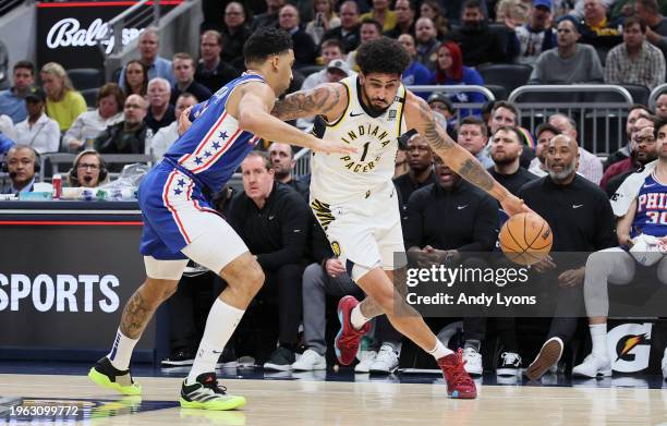 Obi Toppin of the Indiana Pacers dribbles the ball against the Philadelphia 76ers during the second half of the game at Gainbridge Fieldhouse on...