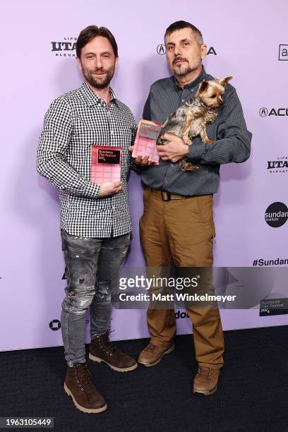 Directors Brendan Bellomo and Slava Leontyev hold the U.S. Grand Jury Prize: Documentary for their film Porcelain War during the 2024 Sundance Film...