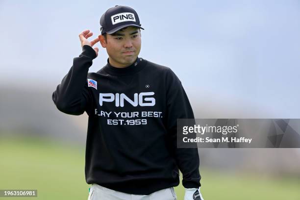 Taiga Semikawa of Japan lines up a putt on the fourth green during the third round of the Farmers Insurance Open at Torrey Pines South Course on...