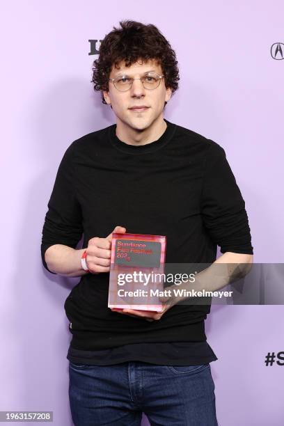 Jesse Eisenberg holds the Waldo Salt Screenwriting Award for the filmA Real Pain during the 2024 Sundance Film Festival Awards at The Ray on January...