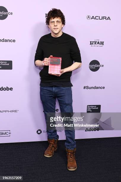 Jesse Eisenberg holds the Waldo Salt Screenwriting Award for the filmA Real Pain during the 2024 Sundance Film Festival Awards at The Ray on January...
