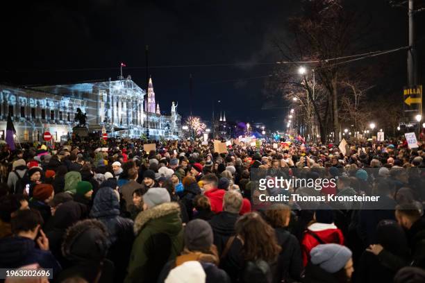 People gather in front of the Austrian Parliament to protest against right-wing extremism as similar demonstrations are taking place elsewhere across...