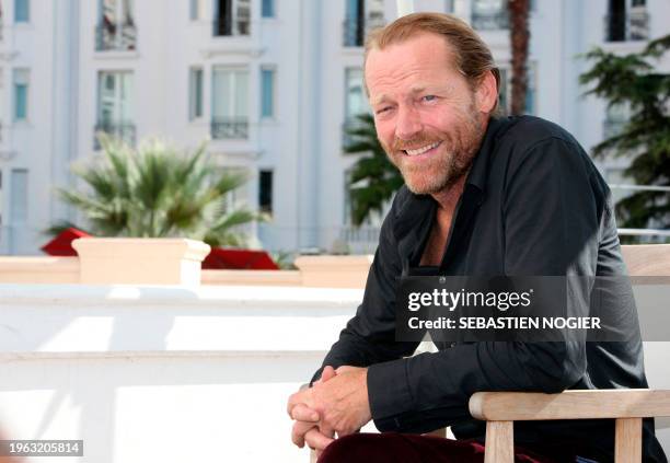 Scottish actor Iain Glen poses during a photocall to promote "Jack Taylor", on October 3, 2011 in Cannes, southern France, during the international...