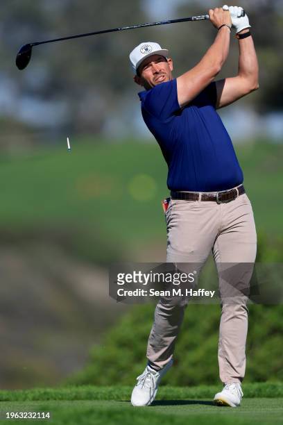 Scott Stallings of the United States plays his shot from the fifth tee during the third round of the Farmers Insurance Open at Torrey Pines South...